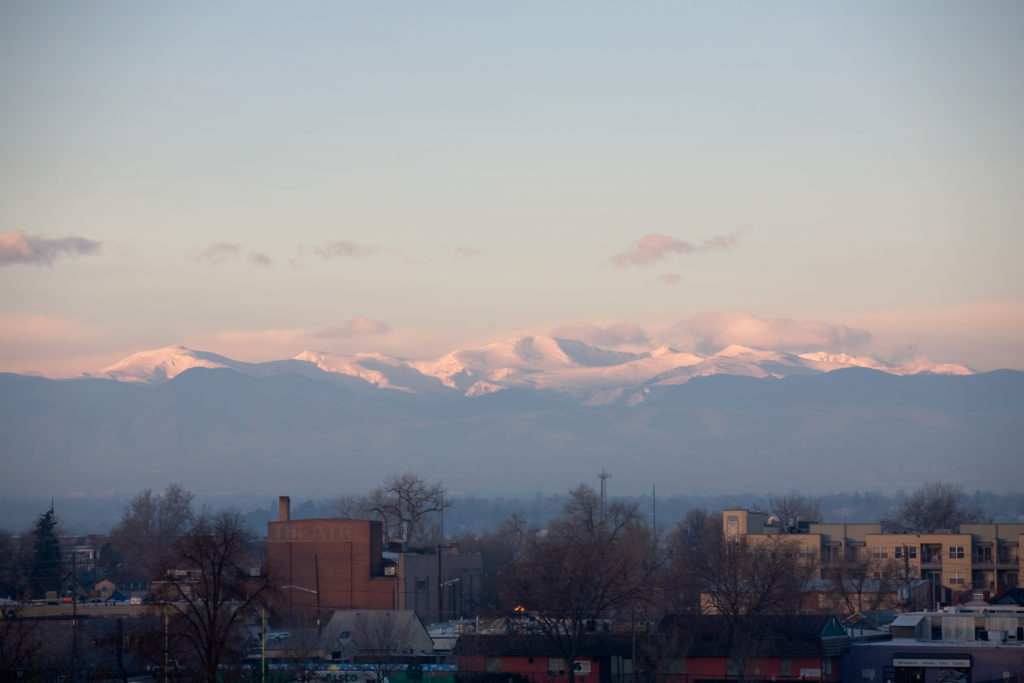 A grainy image of Mount Evans at sunrise.